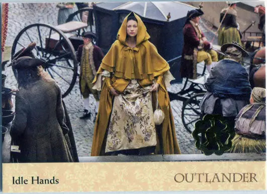 Woman in yellow hooded cloak and floral dress featuring Gold Jacobite Seal Parallel Variant