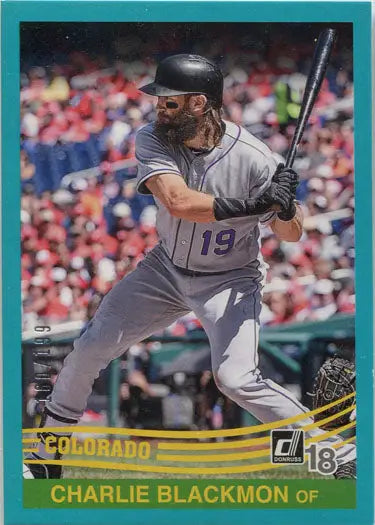 Teal parallel trading card of Charlie Blackmon in gray uniform at bat