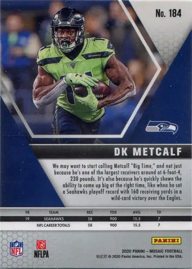 DK Metcalf in bright green Seattle Seahawks uniform running with ball on base card