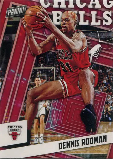 Basketball trading card of Dennis Rodman mid-jump from Panini Player of the Day Base Card