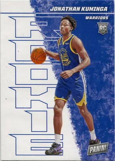 Basketball trading card of Jonathan Kuminga dribbling in Warriors blue uniform