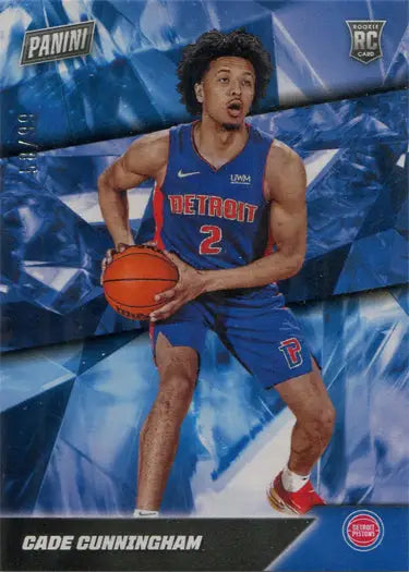 Cade Cunningham in a Detroit Pistons uniform holding a basketball on insert card