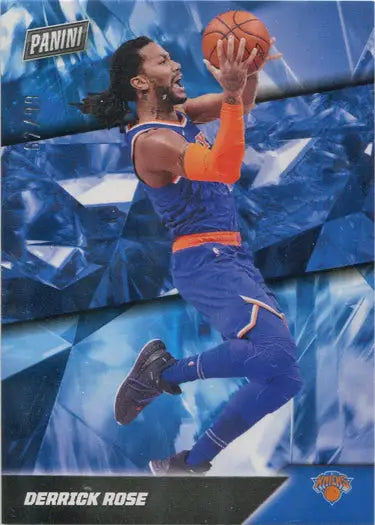 Basketball player in mid-air with a ball in blue and orange uniform for NBA insert card