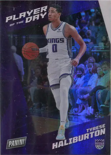Basketball trading card of Tyrese Haliburton dribbling in rainbow parallel design