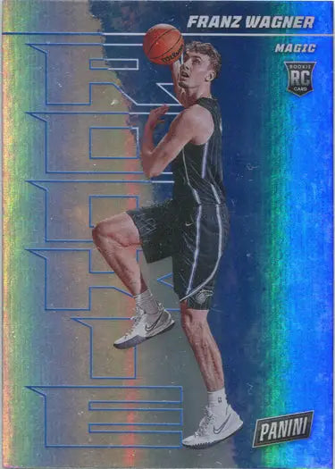 Basketball trading card of Franz Wagner in dark uniform, featuring rainbow parallel design