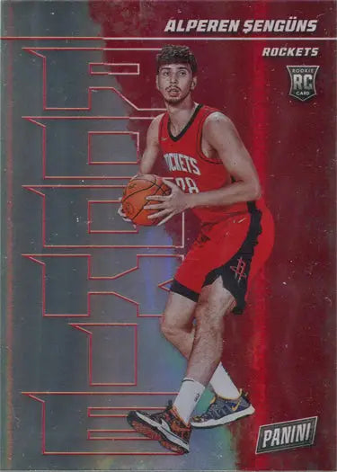 Basketball player in red Houston Rockets uniform with ball on Panini Rainbow Parallel trading card