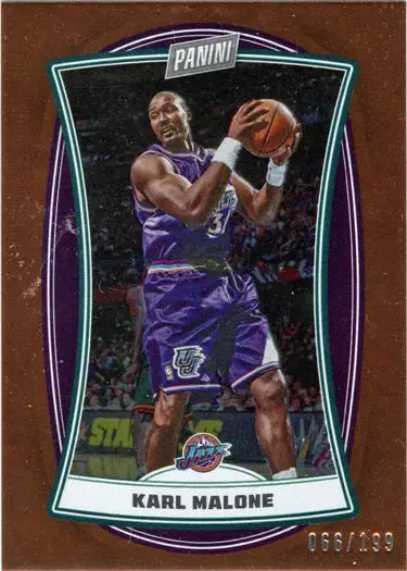 Basketball trading card of Karl Malone in orange foil parallel Utah Jazz uniform