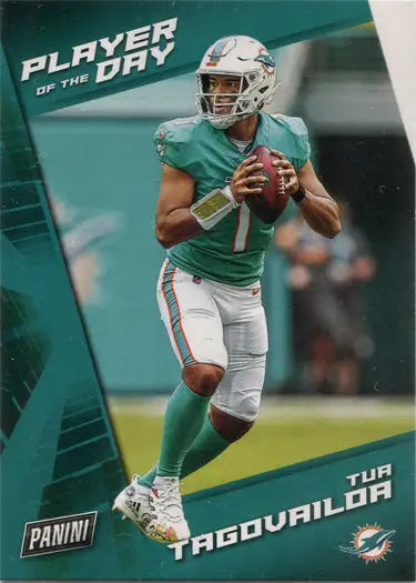 Football player in teal Miami Dolphins uniform on field for Panini base card trading cards