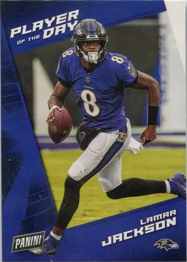 Football player in purple Baltimore Ravens uniform running with ball on base card