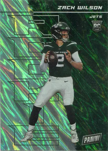 Zach Wilson silver parallel trading card on green holographic background in throwing stance