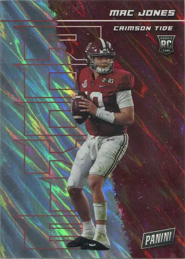 Football player in crimson uniform throwing a football on Panini 2021 Silver Parallel Card