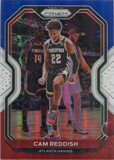 Basketball trading card of Cam Reddish in action on the court, red white blue parallel