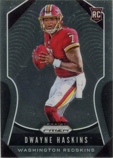 Football player in red jersey with ball on Panini Prizm 2019 Base Rookie Card 303 Dwayne Haskins