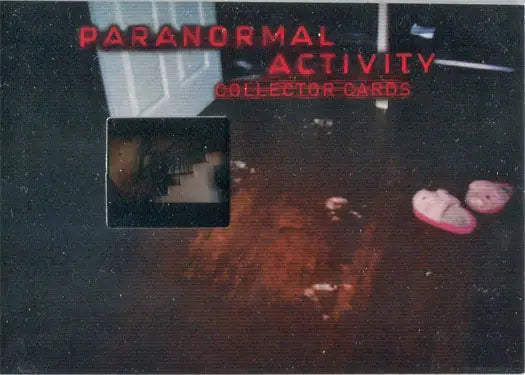 Collector card featuring spooky imagery from Paranormal Activity Film Frame Cell Chase