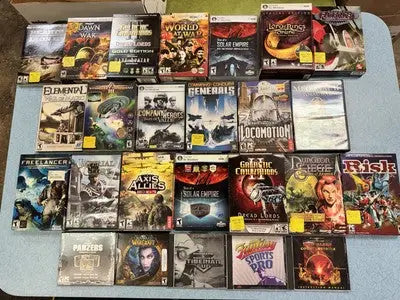 Collection of PC game boxes featuring medieval themes, galactic civilizations, and solar empire games