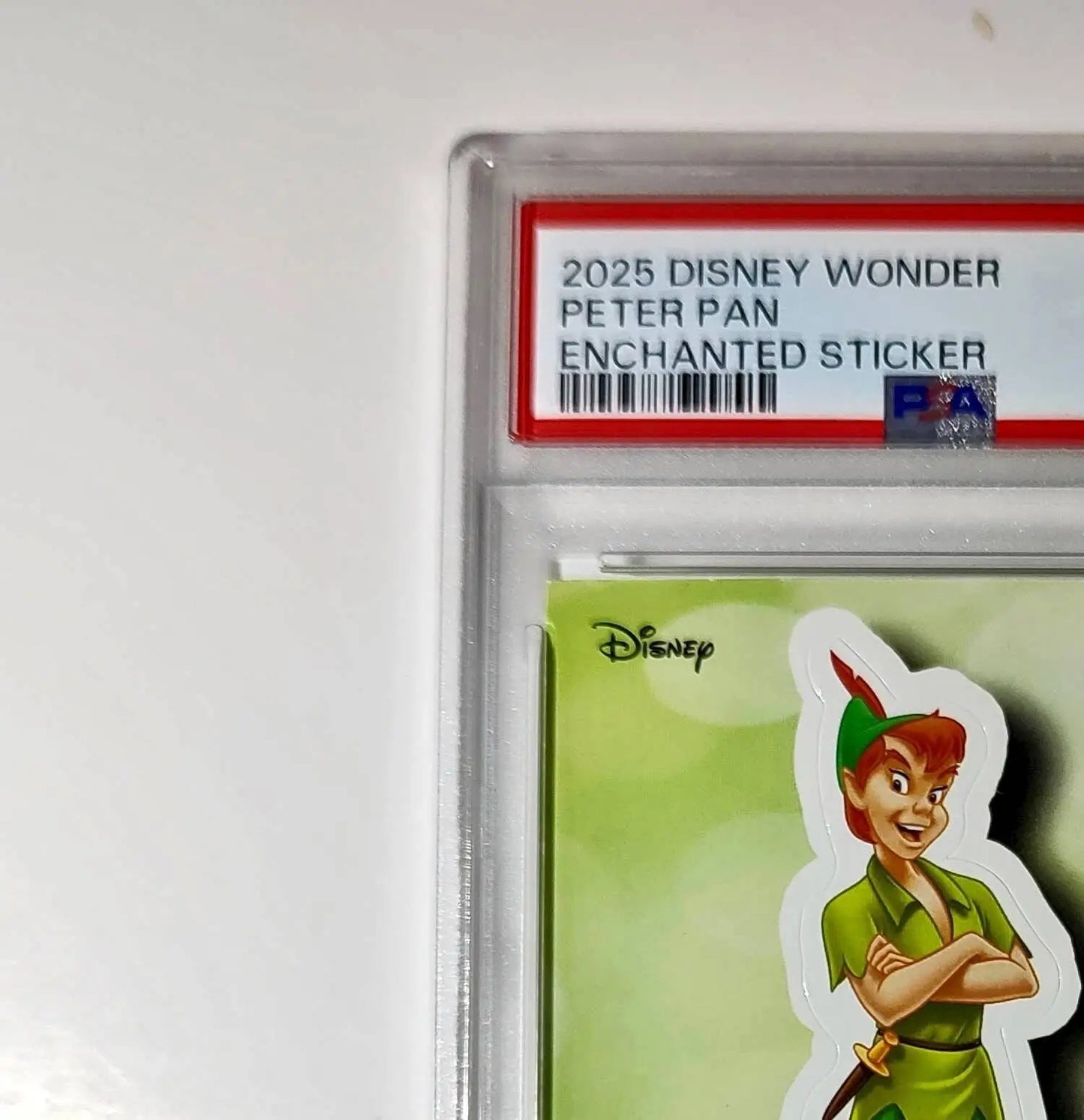 Peter Pan 2025 Topps Disney #ES-8 Enchanted Sticker Card Peter Pan PSA 8 - Non-Sports Card Single