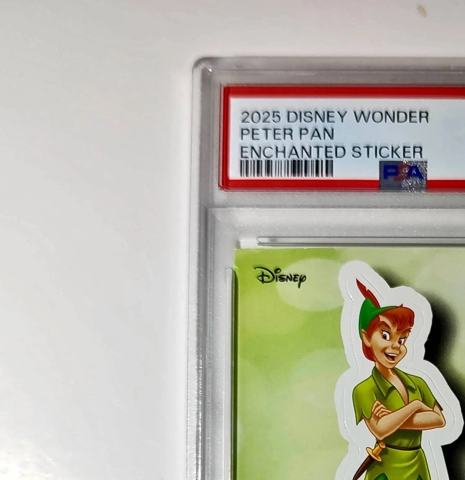 Peter Pan 2025 Topps Disney #ES-8 Enchanted Sticker Card Peter Pan PSA 8 - Non-Sports Card Single