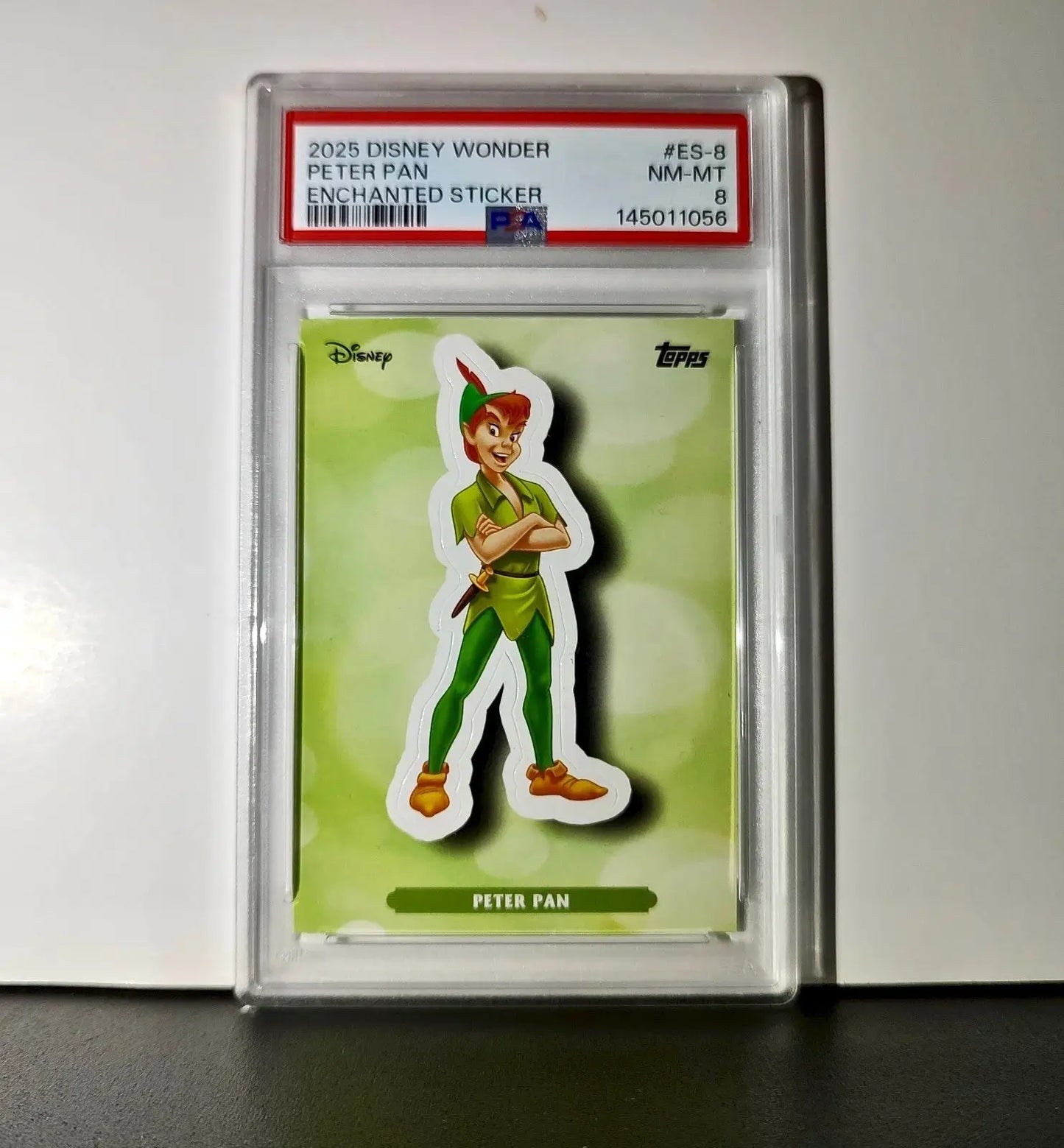 Peter Pan 2025 Topps Disney #ES-8 Enchanted Sticker Card Peter Pan PSA 8 - Non-Sports Card Single