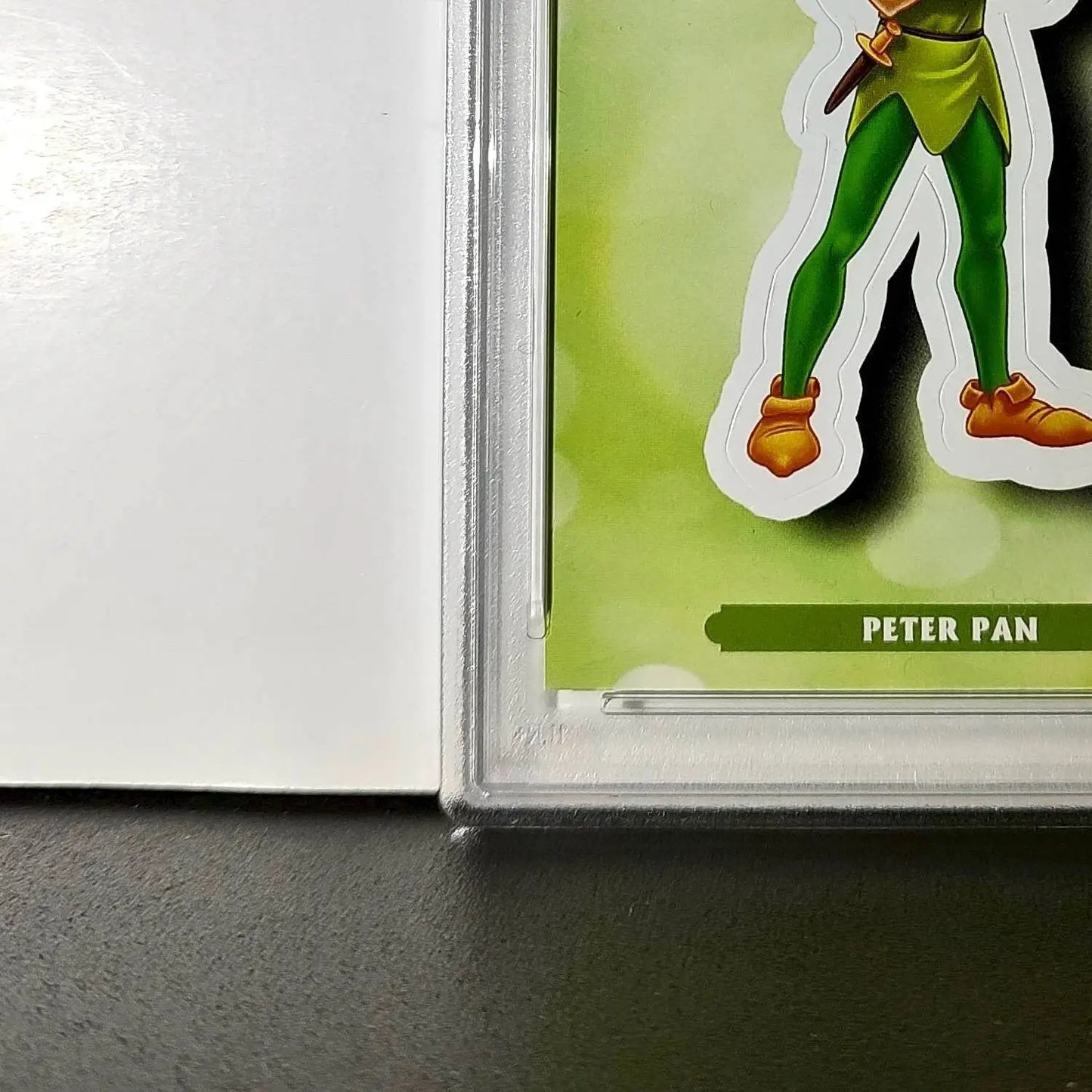 Peter Pan 2025 Topps Disney #ES-8 Enchanted Sticker Card Peter Pan PSA 9 - Non-Sports Card Single