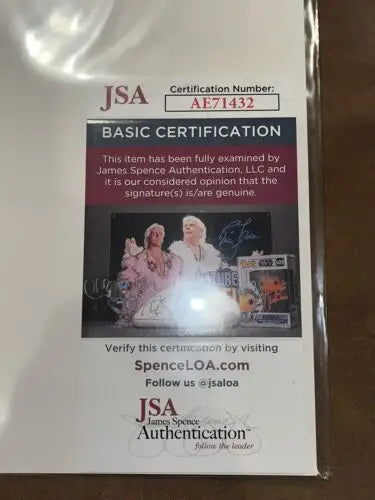 JSA authentication sticker on Phil Rizzuto signed Sport Magazine story pages photo