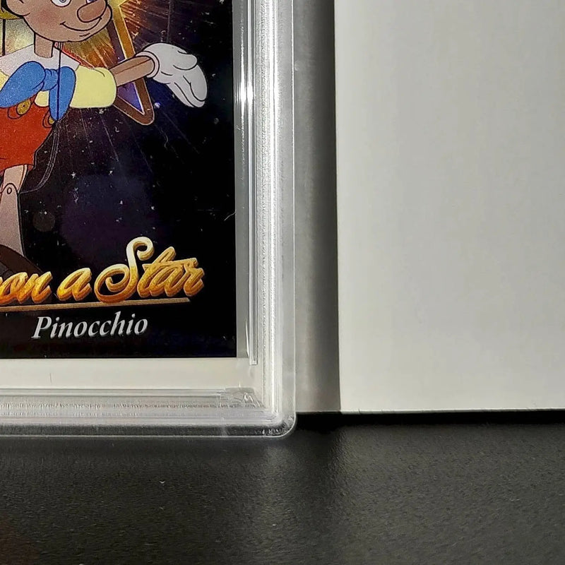 Pinocchio 2025 Topps Chrome Disney #W-1 Wish Upon A Star Die Cut Pinocchio PSA 8 - Non-Sports Card Single