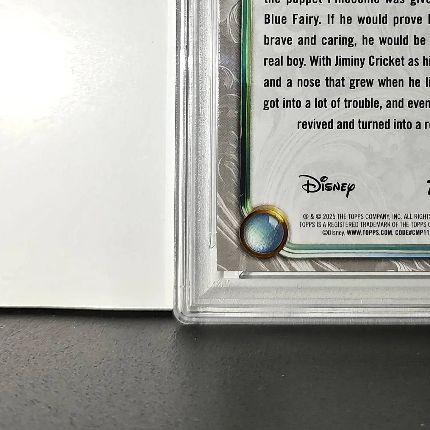 Pinocchio 2025 Topps Disney Wonder #7 Winter Variant Card Pinocchio PSA 8