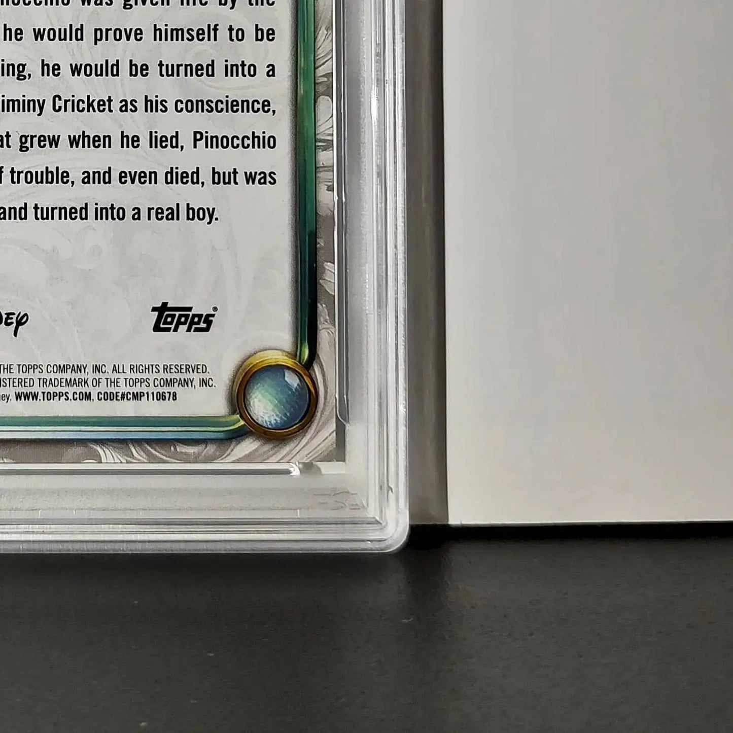 Pinocchio 2025 Topps Disney Wonder #7 Winter Variant Card Pinocchio PSA 8