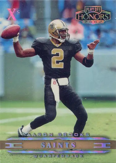 Football player in black Saints uniform throwing pass on Playoff Honors trading card