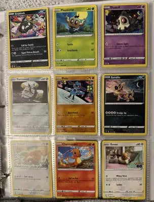 Pokémon card binder collection with nine protected trading cards in protective sleeves