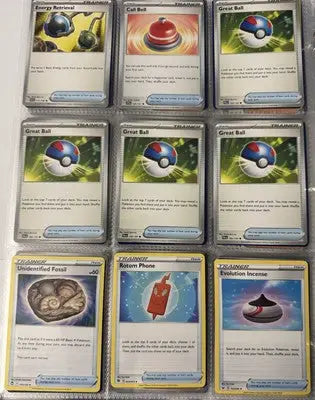 Pokemon card binder collection with eleven trading cards in a popular binder collection