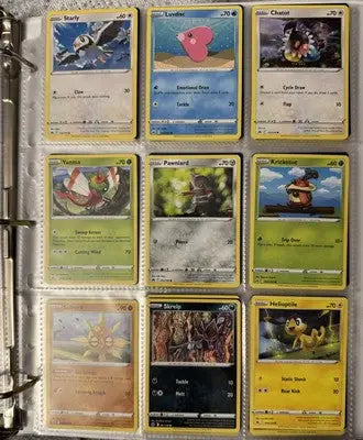 Pokémon card binder collection with nine trading cards displayed in a binder collection