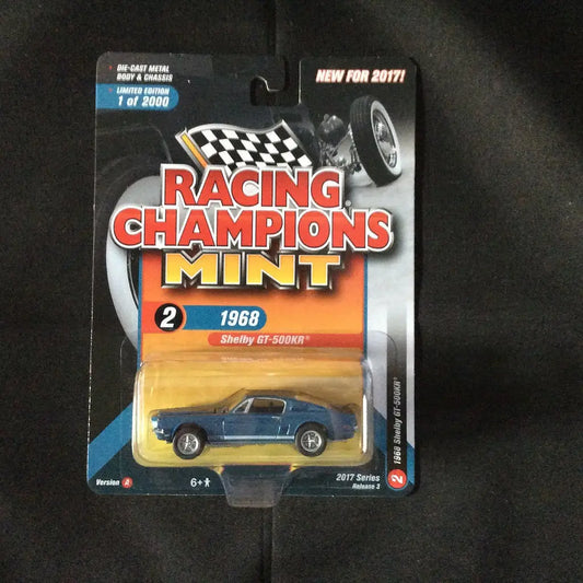 Packaged die-cast model of a blue 1968 Shelby GT 500KR by Racing Champions Mint