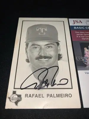 Signed Rafael Palmeiro baseball card 3x5 team issue from Texas Rangers with JSA autograph
