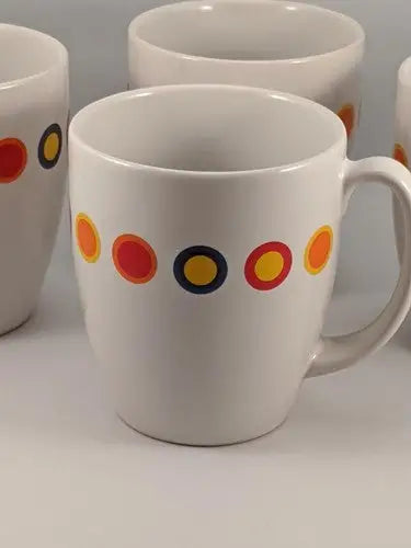 White ceramic mug with colorful polka dots from Rare Contemporary Corelle set of 12oz mugs