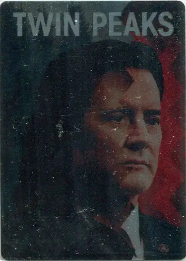 Serious man in dark suit on red and black background for Twin Peaks case topper card