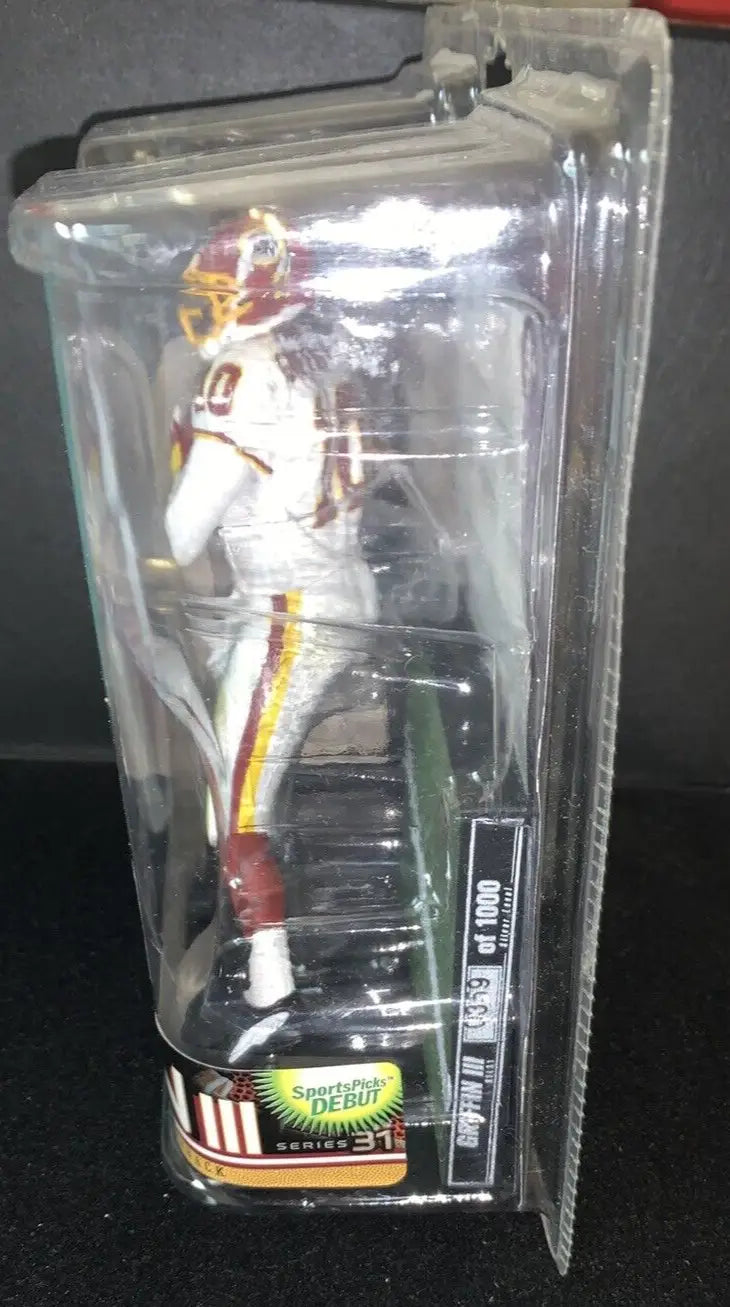 Football player figurine in packaging, Robert Griffin RG3 action figure white variant
