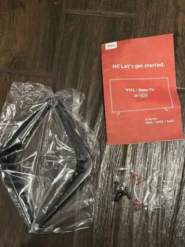 TCL Roku TV setup components for S-Series S401 S403 S405 with TV stand brackets and hardware