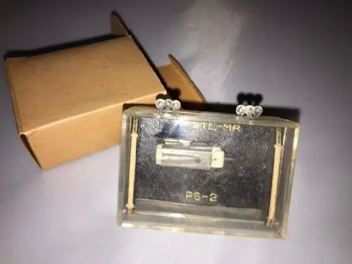 Clear plastic encased electrical component for Rystl-MR PS-2 cartridge record player