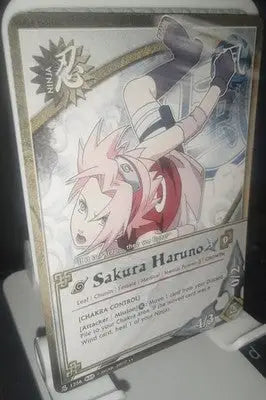 Sakura Haruno - 1256 - Rare - Weapons of War NM/LP - Naruto TCG Rainbow Letters