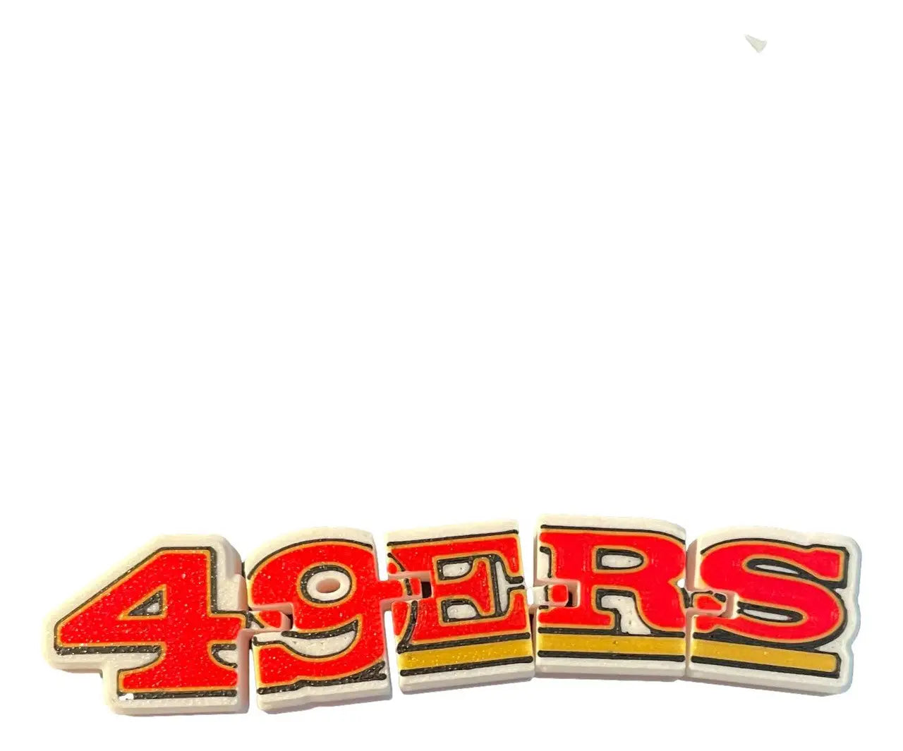 San Francisco 49ers puzzle-piece magnet set on San Francisco 49ers Flexi Logo Sign