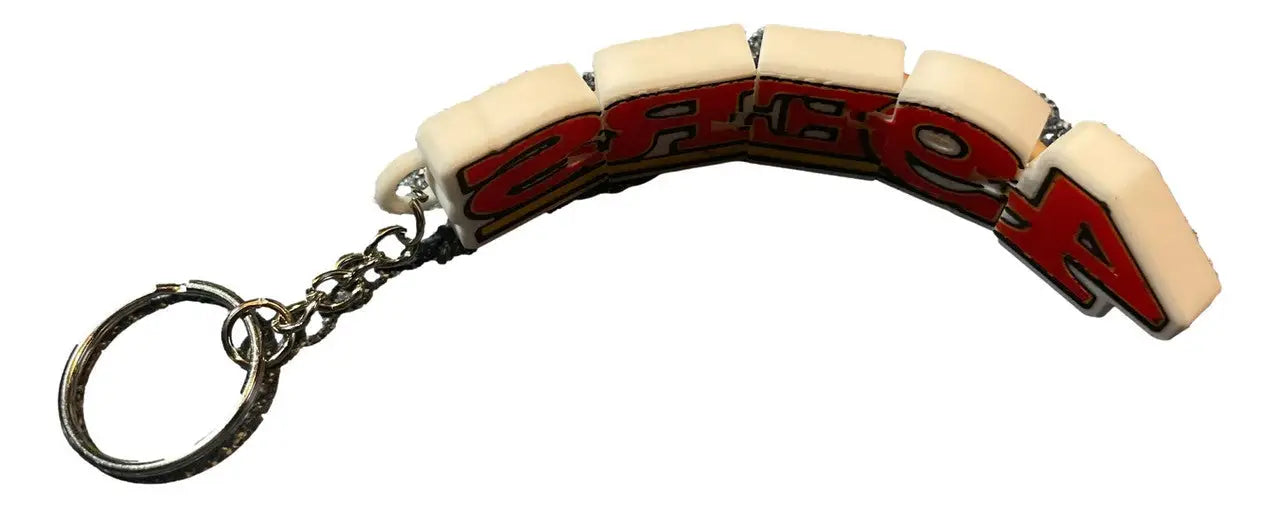 Curved segmented san francisco 49ers NFL football fan keychain with red lettering and white border