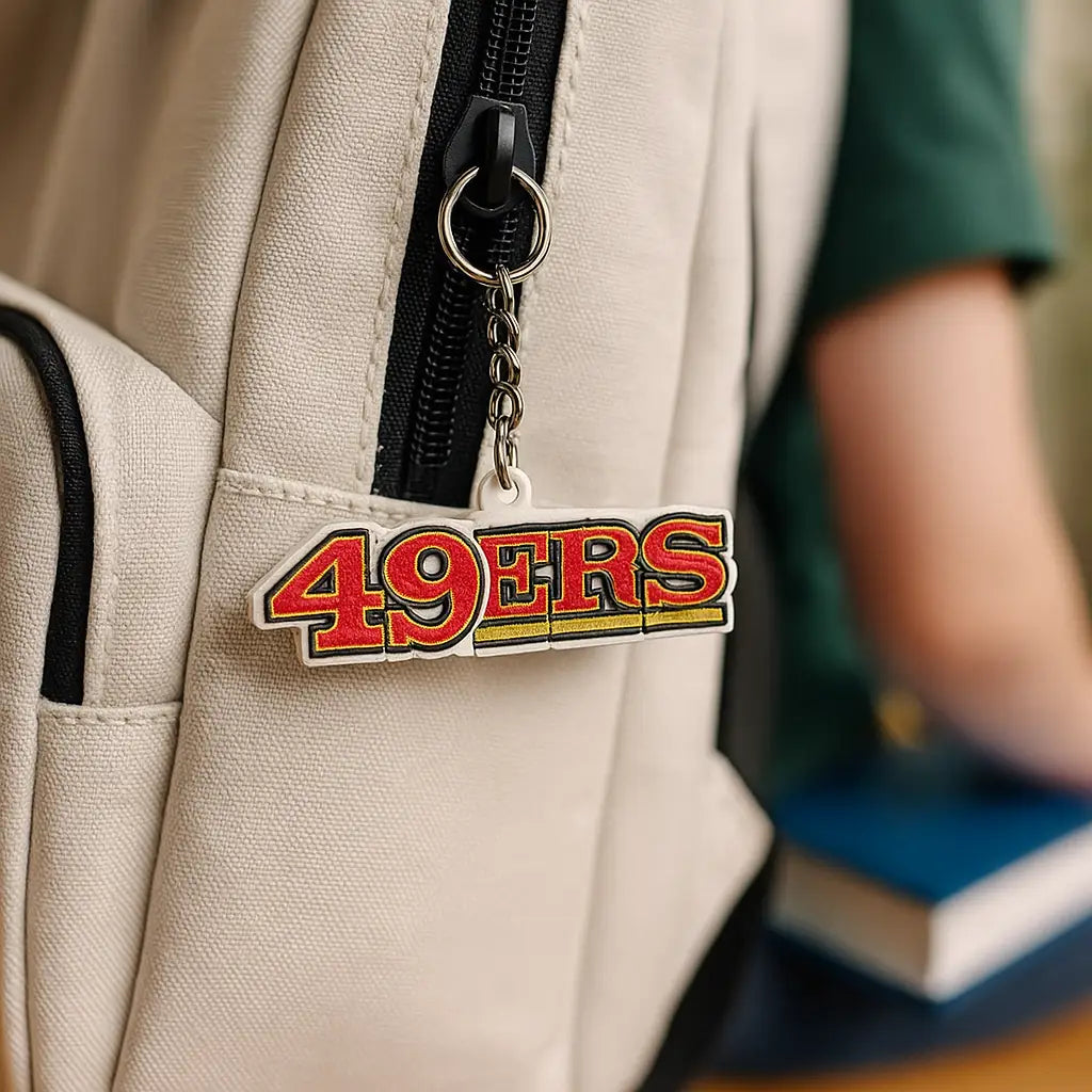 Cream-colored canvas backpack with san francisco 49ers keychain NFL football fan gift