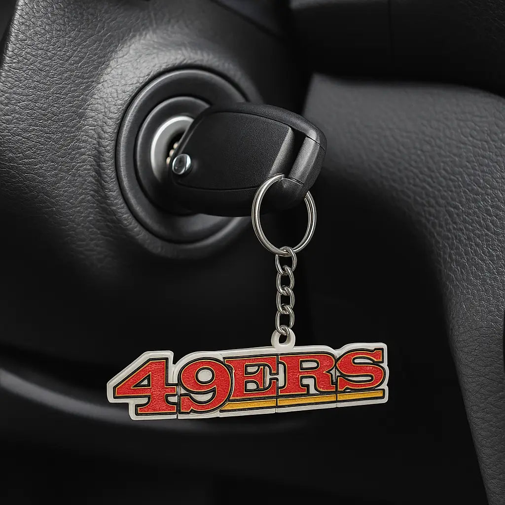 Black car key in ignition with san francisco 49ers keychain NFL football fan gift