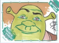 Green cartoon ogre face with a smirk on Tone Rodriguez Sketch Card from Shrek the Third