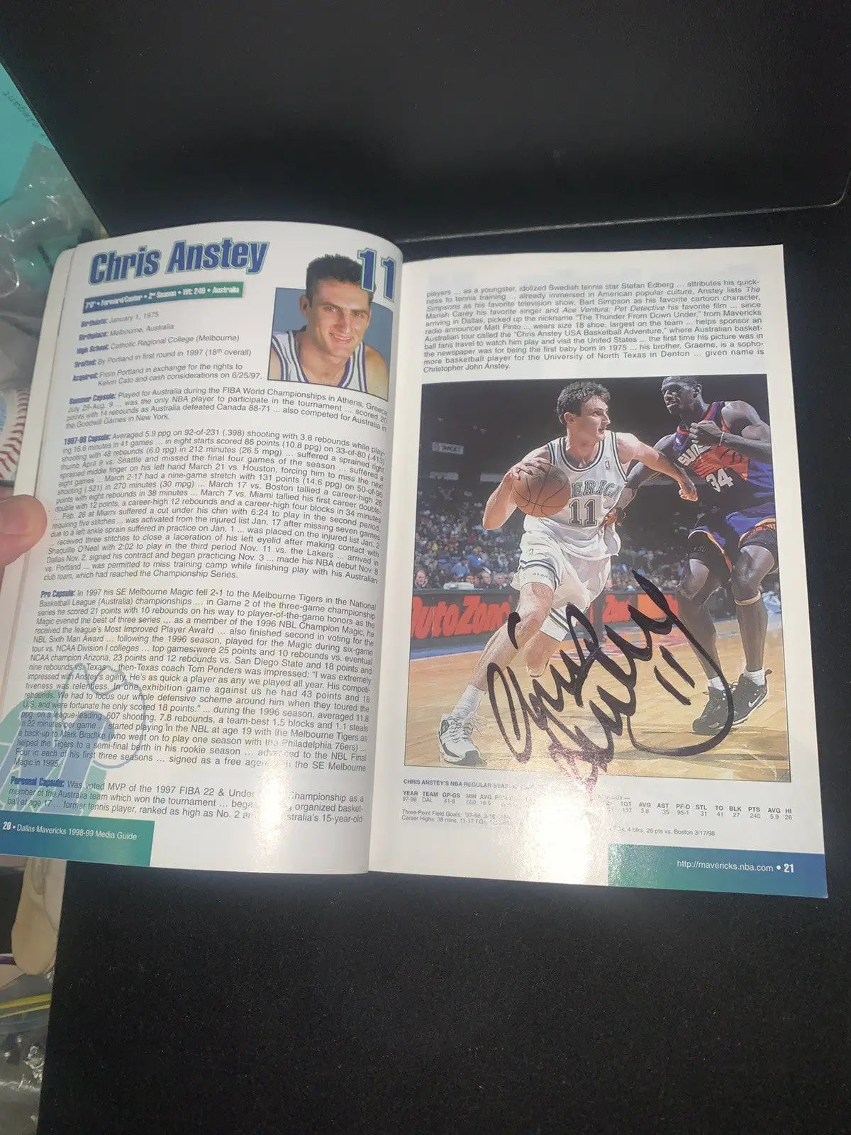 Autographed Chris Anstey basketball book with signed Dallas Mavericks media guide