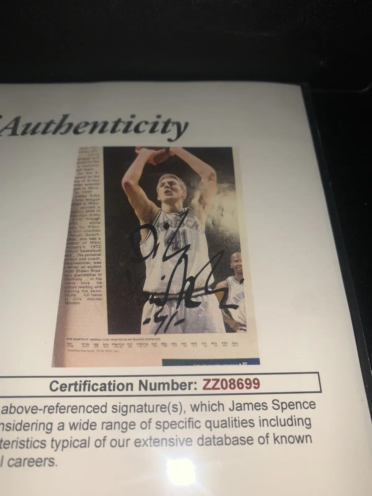 Autographed Dallas Mavericks Media Guide basketball card with JSA authentication
