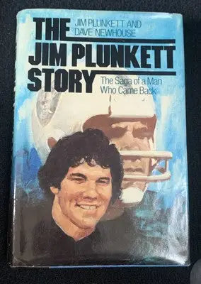 Signed Jim Plunkett story book cover showcasing The Jim Plunkett Story HC Auto JSA