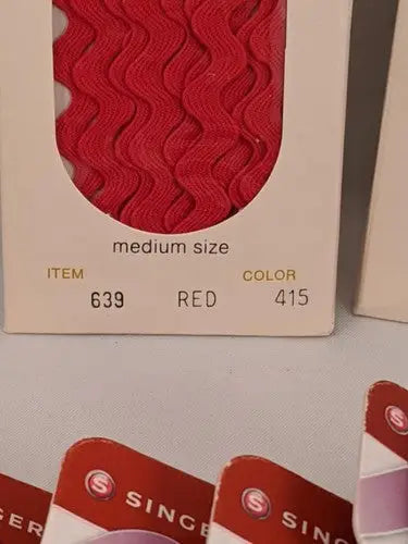 Red rick rack trim on a card for Singer Valentine’s Day red dress ribbons and heart ribbons