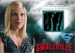 Trading card featuring a blonde woman in a teal dress with Smallville logo