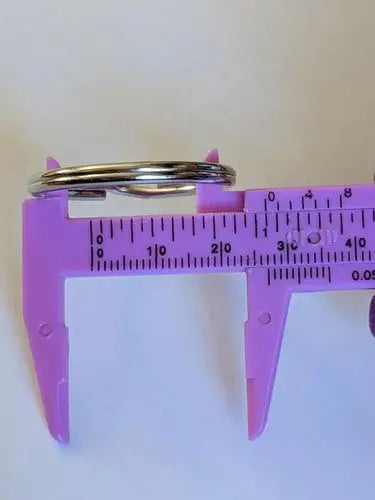 Metal split key ring measured by pink calipers 27mm x 23mm for split key rings